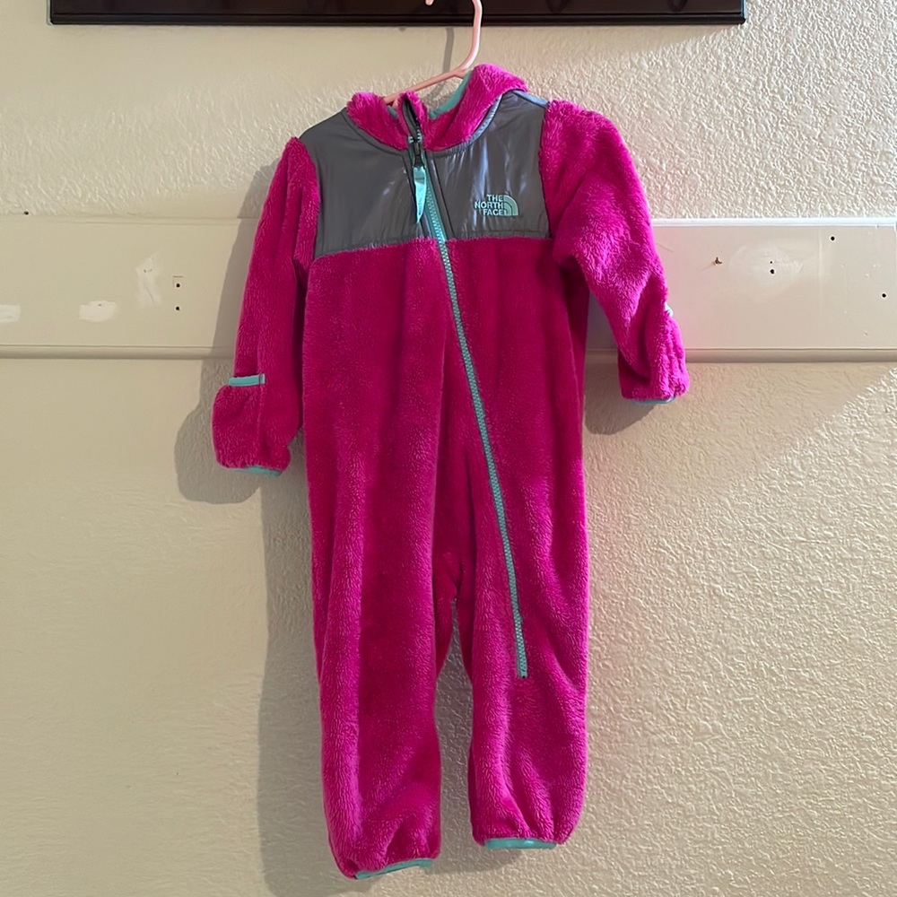 Hot pink North Face fleece jacket to keep baby warm